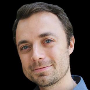 A headshot of Devin Powell, science writer.